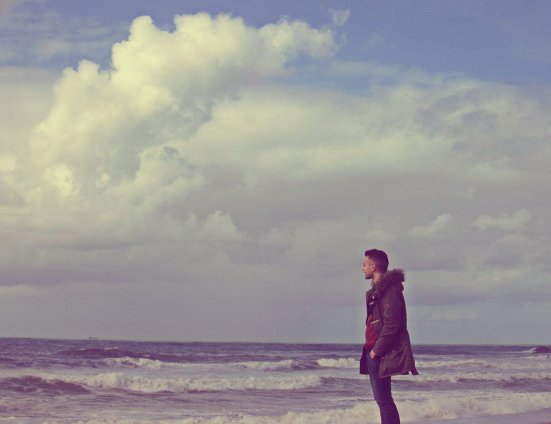 man looking out to the distance 